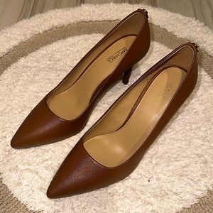 Michael Kors pointed toe, slip-on Alina flex pumps.